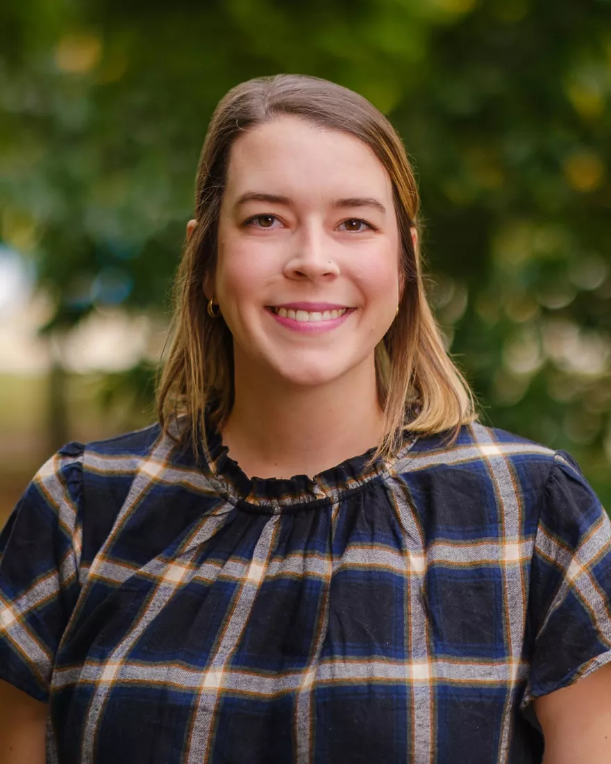 Beka Hott, academic advisor, smiling. 